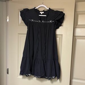 Black Dress with White Bow Accents